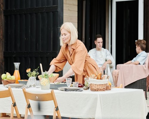 Family table set with fruits and water in a calm atmosphere