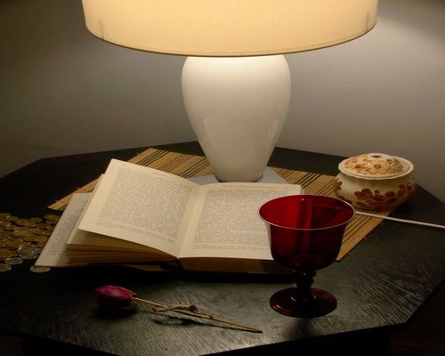 Quiet evening setting with a glass of water on a side table